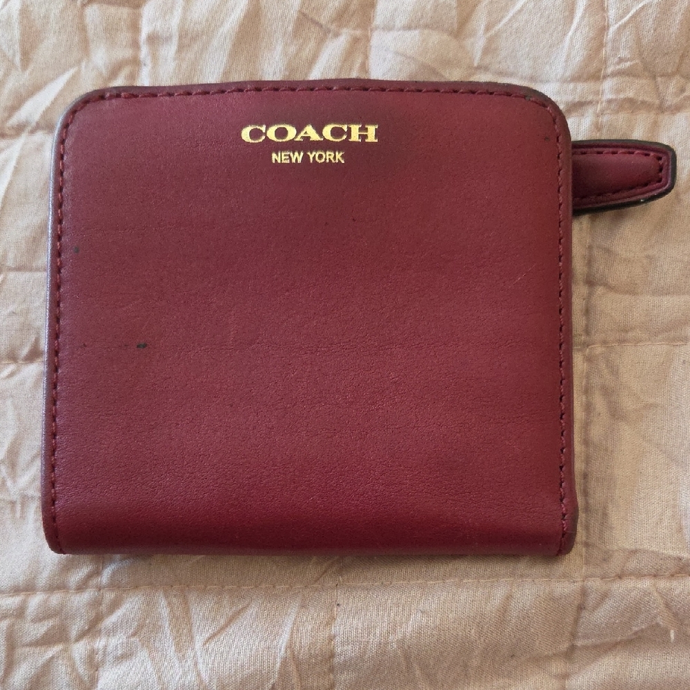 COACH Burgundy Zip Wallet with Gold Logo